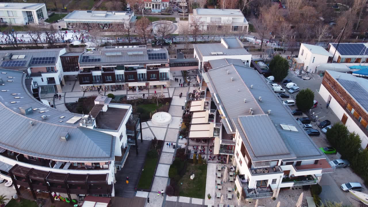 Straight-down drone view of marina structures and moored boats in Balatonfured harbor