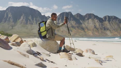 Sporty-mixed-race-man-with-prosthetic-leg-hiking