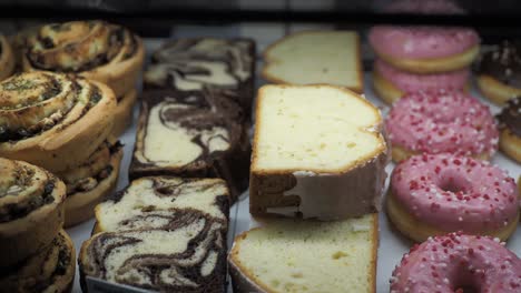 assortment of delicious pastries and donuts at a bakery