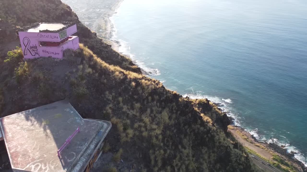 Drone view of pink bunker on mountain in Hawaii