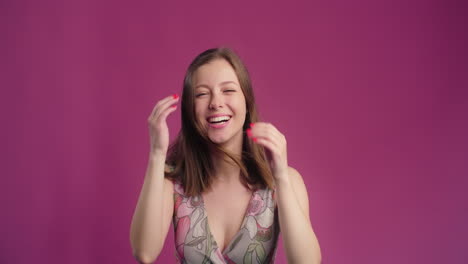 woman with straw hat expressing surprise and joy