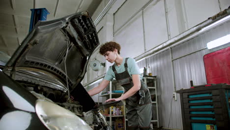 woman working on a garage