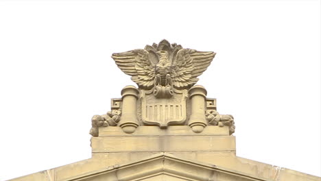 eagle carving on the outside of an historic theater