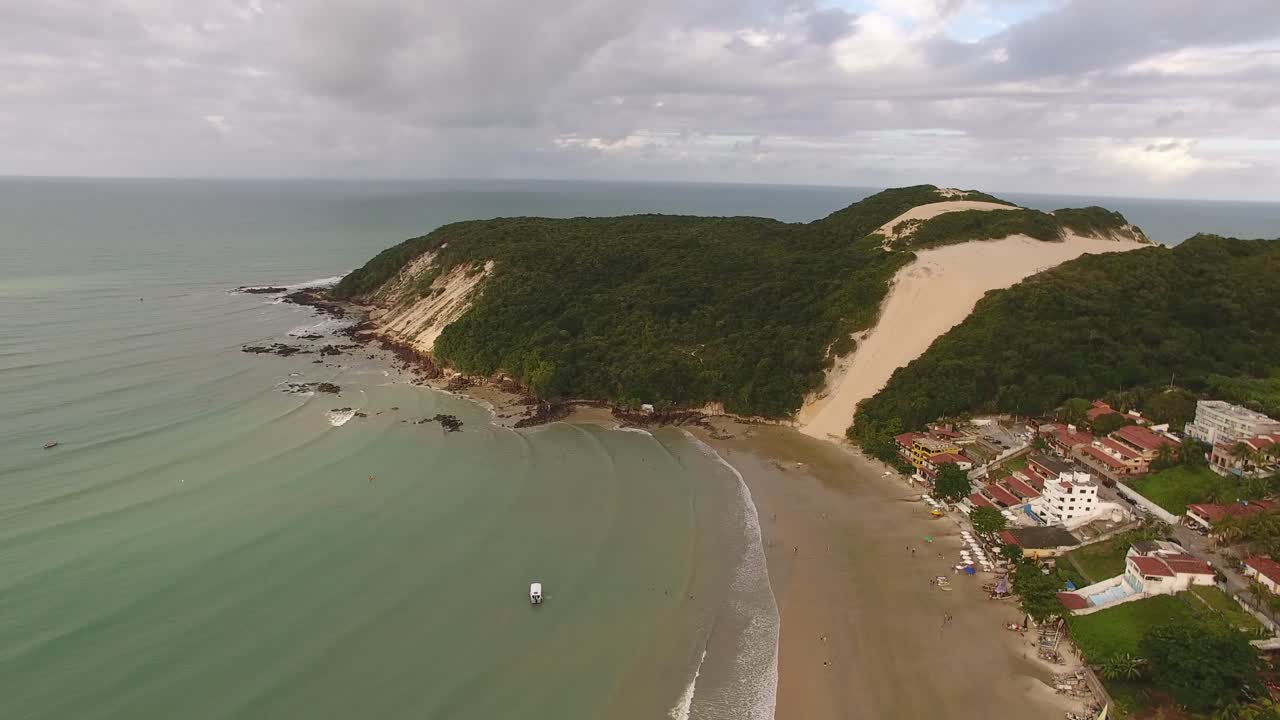 Coastal Landscape with Sand Dunes and Turquoise Water