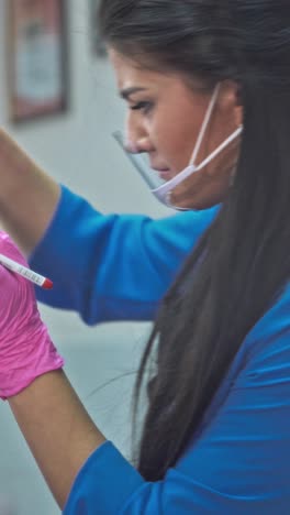cosmetologist making permanent makeup
