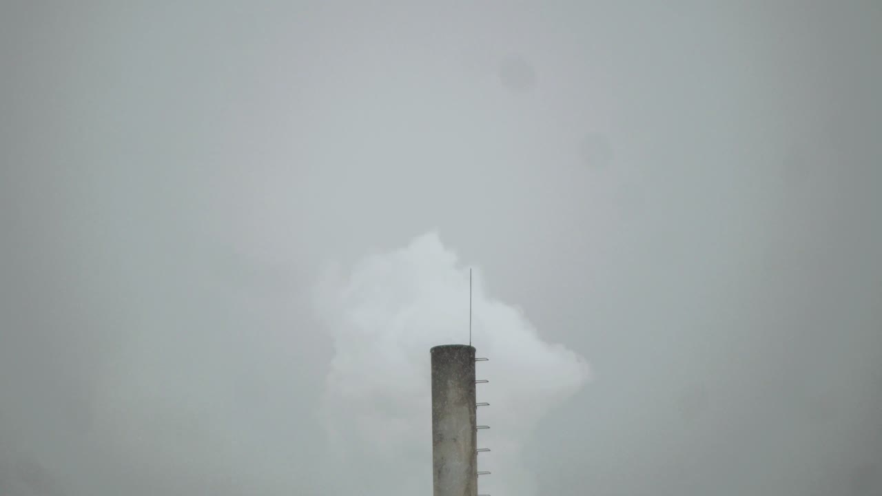 Chimney blowing smoke during winter period