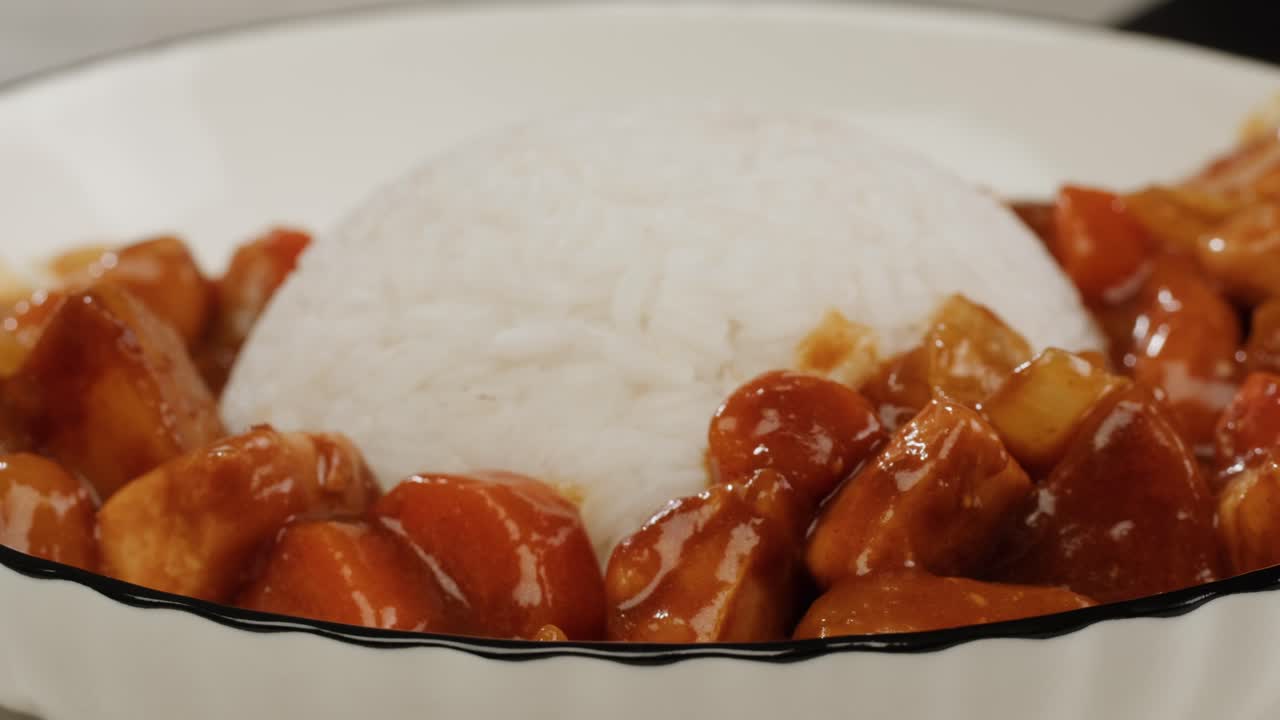 Japanese curry rice with fry pork Tonkatsu, Katsu Kare, Japanese breaded cooking dinner in restaurant, close up macro of asian food