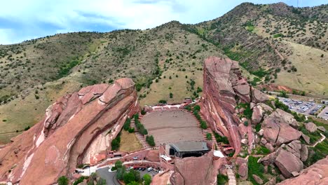 aerial drone flyover towards red rocks amphitheater concert venue and geological site near denver, colorado ,usa
