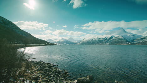 cinematic tracking shot of lyngen fjord by the e6, northern norway