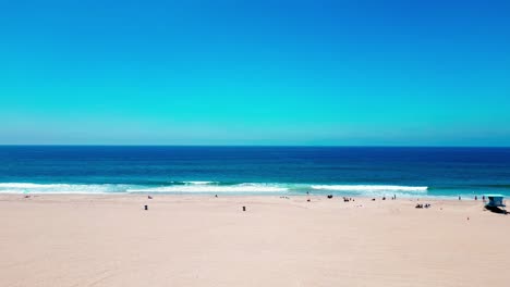 aerial view flying towards the pacific ocean and over the huntington beach in southern california