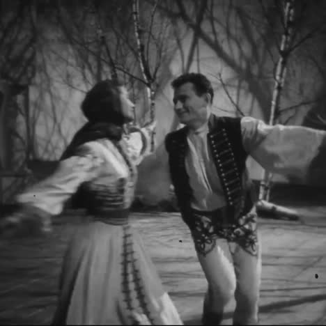 eastern europeans perform a happy traditional dance in the 1950s