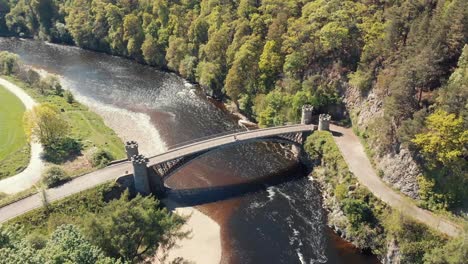 thomas telfords craigellachie bridge over the river spey in scotland