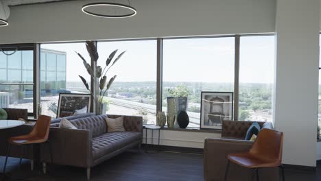 panning shot of empty office interior lounge area in corporate building