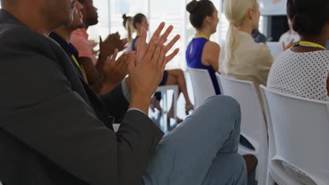 audience clapping at a conference