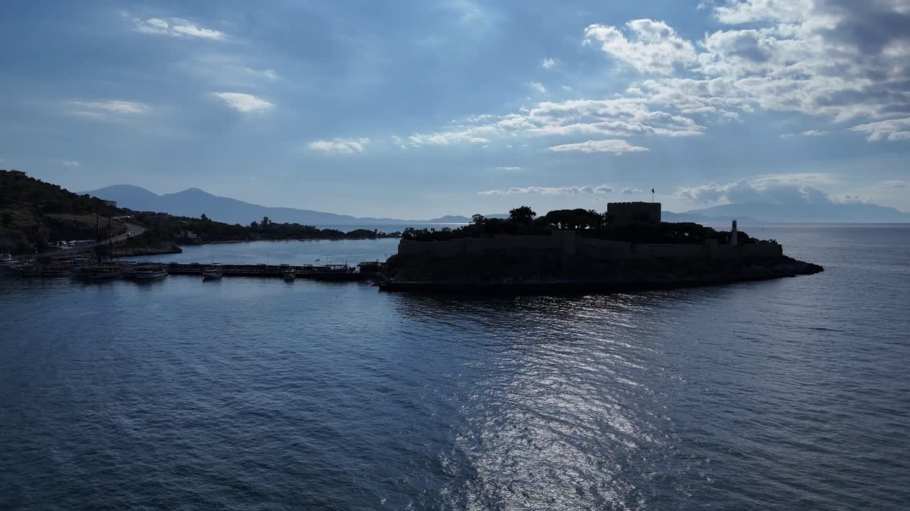 Kasadasi Castle on Pigeon Island, Kusadasi Turkiye, ancient military protection from marauding pirates and maritime invasion invader threats