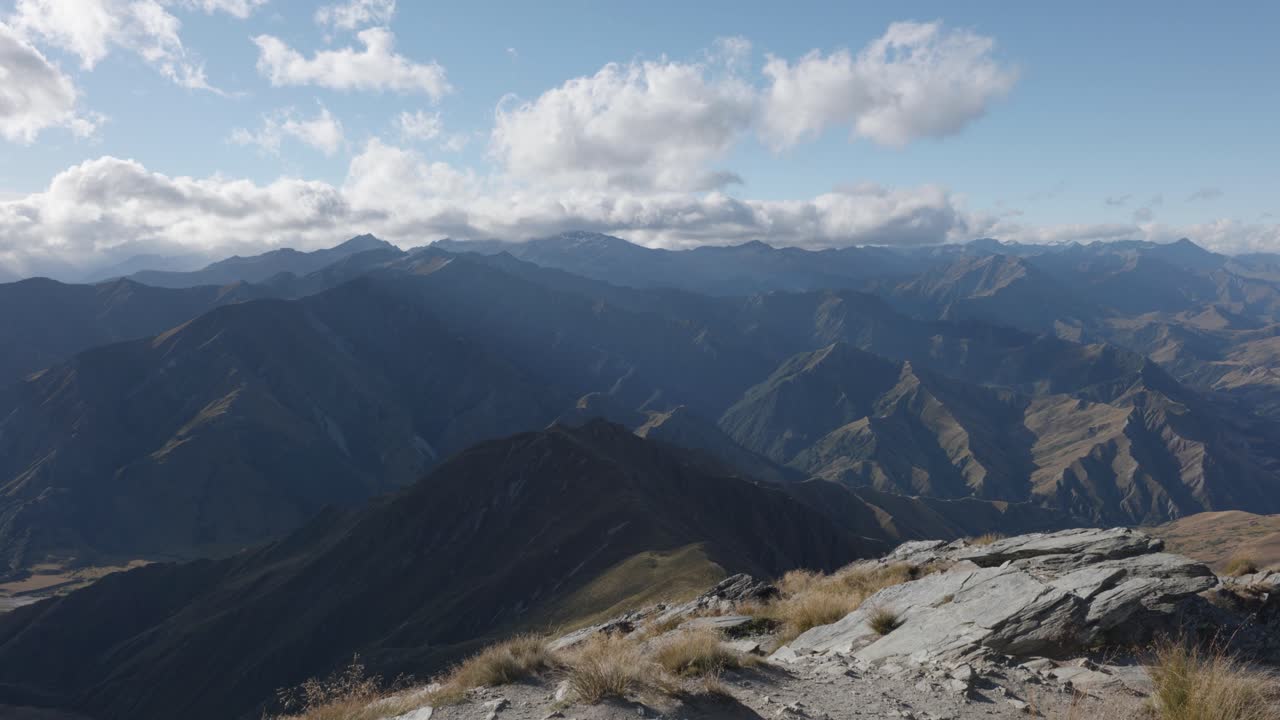 View of mountains and landscape on a sunny summer day at Ben Lomond, Queenstown, New Zealand