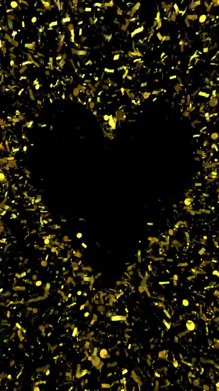 Coriandoli dorati e Glitter che cadono formando una cornice a cuore