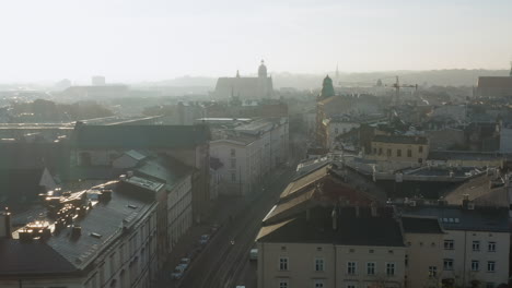 Foggy,-autumn-morning-over-Old-Town,-Kazimierz-and-Stradom-district-in-Krakow