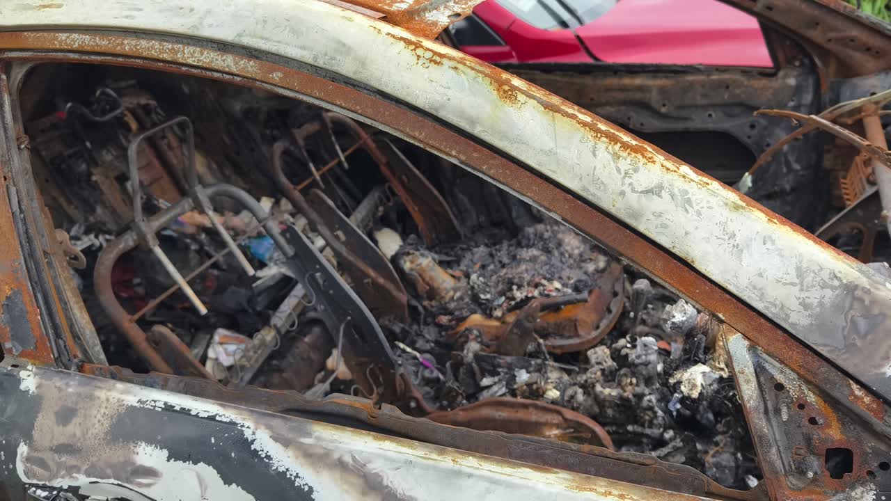 Burnt and Rusty Car Wreckage