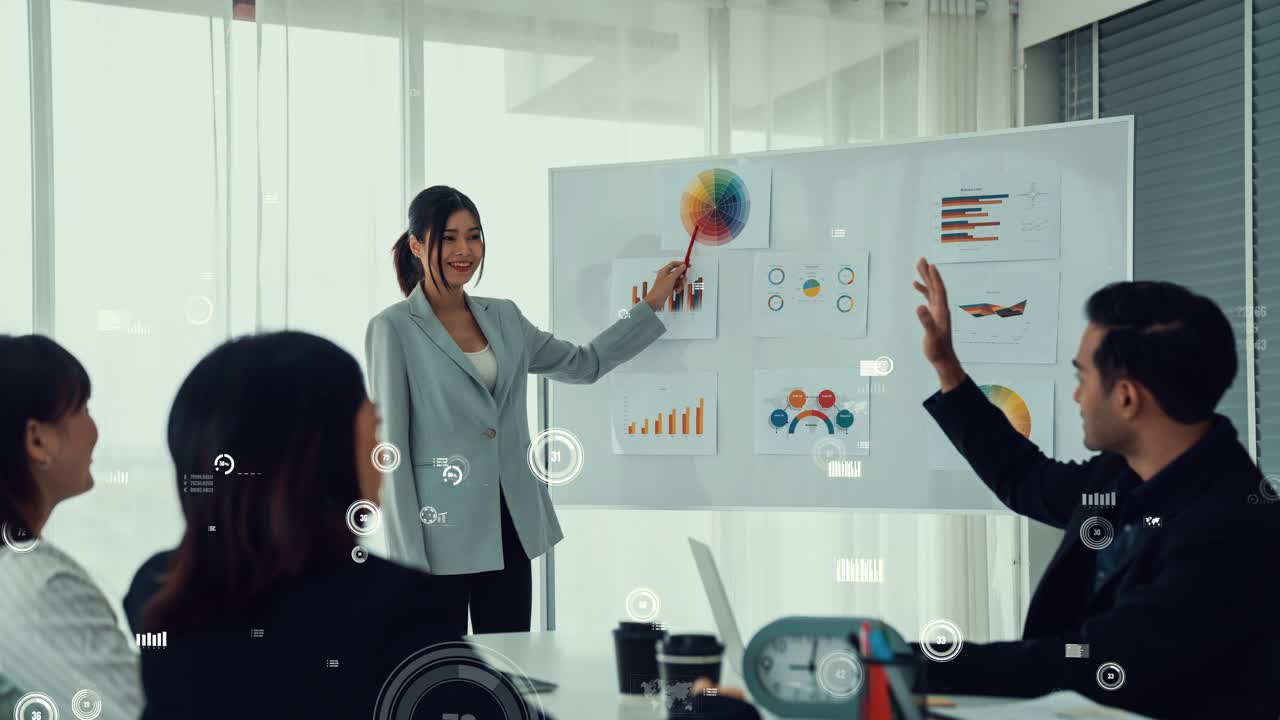 Business people in corporate staff meeting with envisional graphic