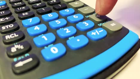 Number-input-into-a-calculator-close-up