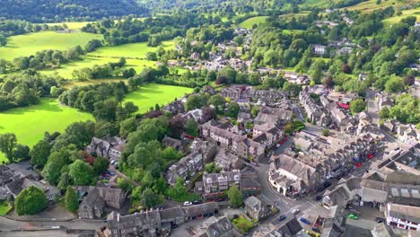 Aerial-footage-of-Ambleside-a-town-and-former-civil-parish,-now-in-the-parish-of-Lakes,-in-Cumbria,-in-North-West-England