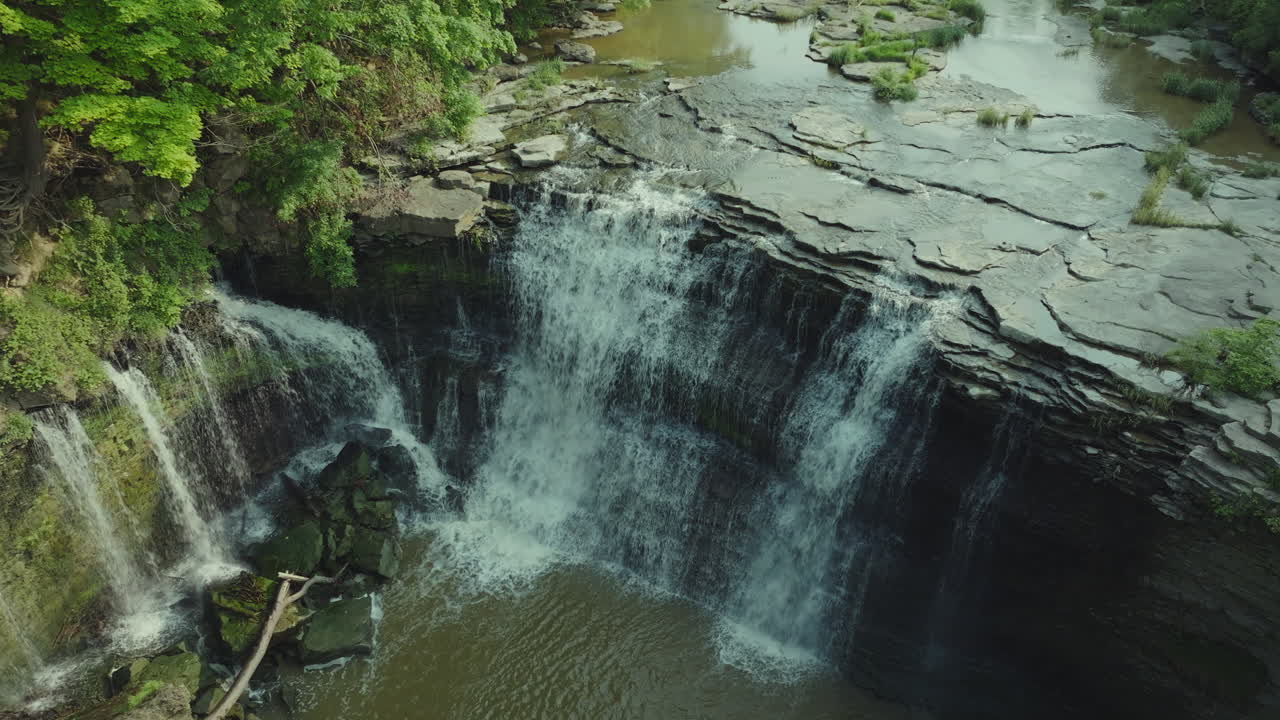 Slow zoom in on main waterfall section at Upper Balls Falls, emphasizing texture and rhythmic water flow