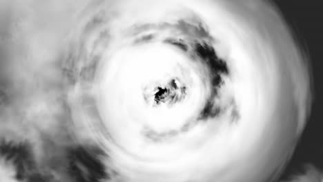 a swirling vortex of clouds in a dramatic black and white image