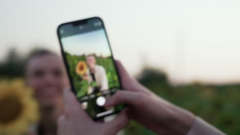 Man-posing-with-sunflower