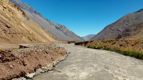 river flowing through mountains in cajón del maipo, central chile