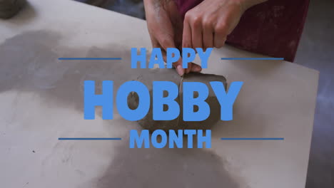 animation of happy hobby day text over midsection of caucasian woman cutting clay
