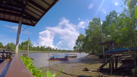 tiempo transcurrido: puerto en el río mae klong, mercado flotante de amphawa, tailandia