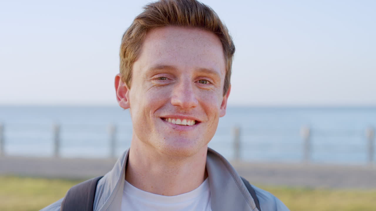 Man, travel and face of a backpacker on a summer