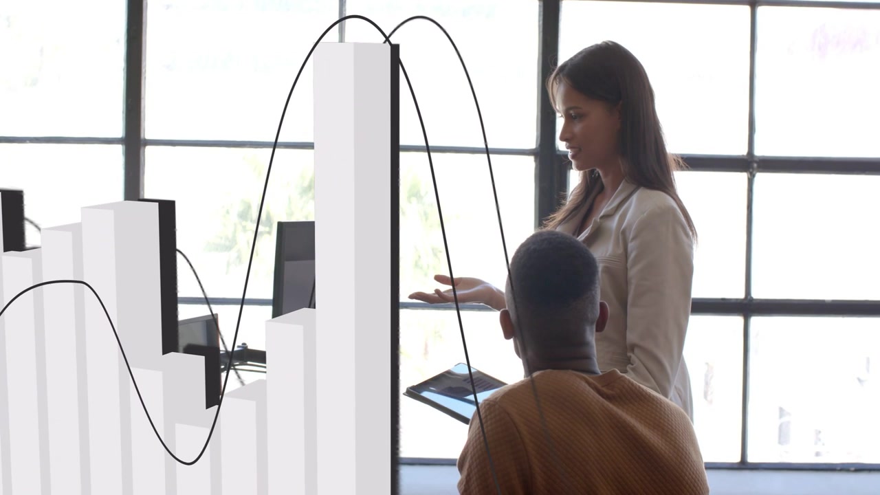 Woman standing showing tablet to seated man, causing 3D chart rising to front for business