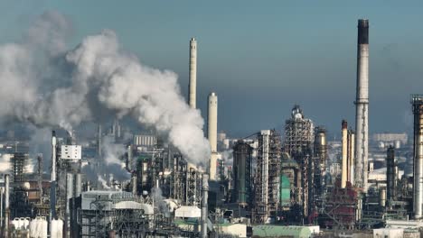 Aerial-Drone-Shot-of-Petrol-Refinery-Bellowing-Smoke