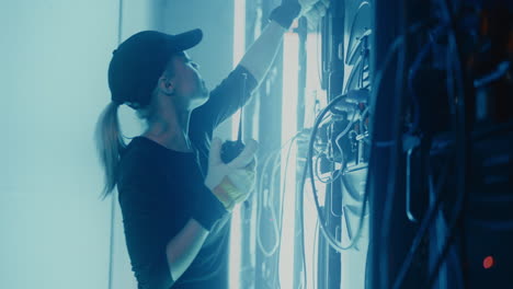 technician working on lighting equipment