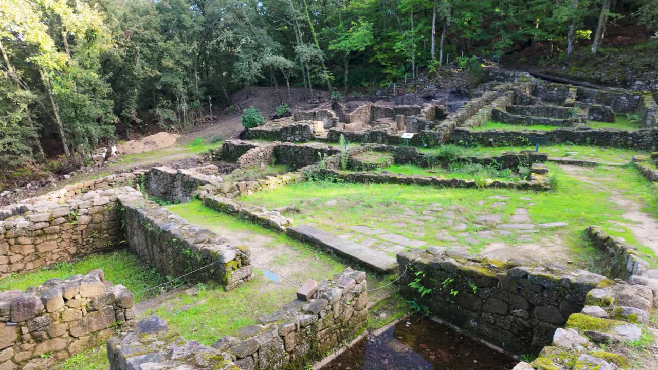 Establishing shot of archaeological ruins at Castro Cibdá de Armeá, Santa Mariña de Augas Santas, Ourense, Galicia