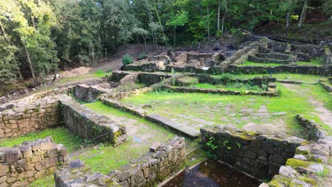 establishing shot of archaeological ruins at castro cibdá de armeá, santa mariña de augas santas, ourense, galicia