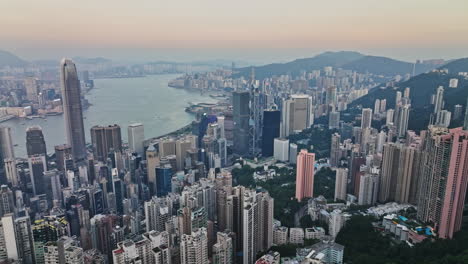 an aerial view of a city and a body of water