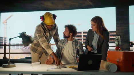 engineers and architects collaborating on a construction project