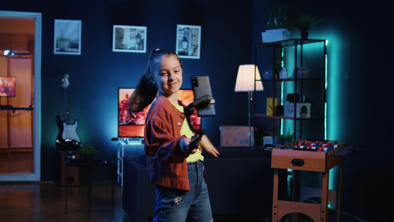 Skilled gen Z girl getting engagement on her dancing clips filmed with selfie stick phone