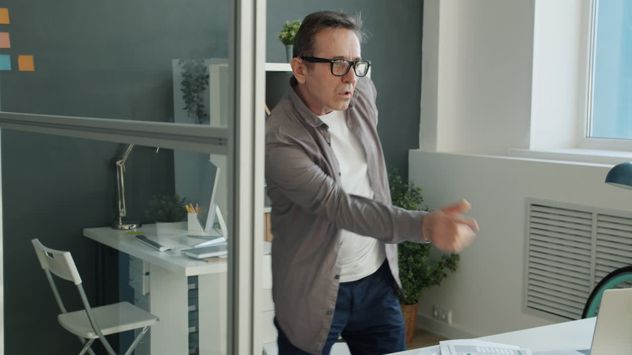 Man Dancing in Office