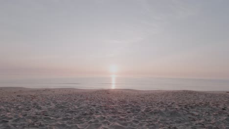 sunrise at knäbäckshusen beach, symmetric static wide shot