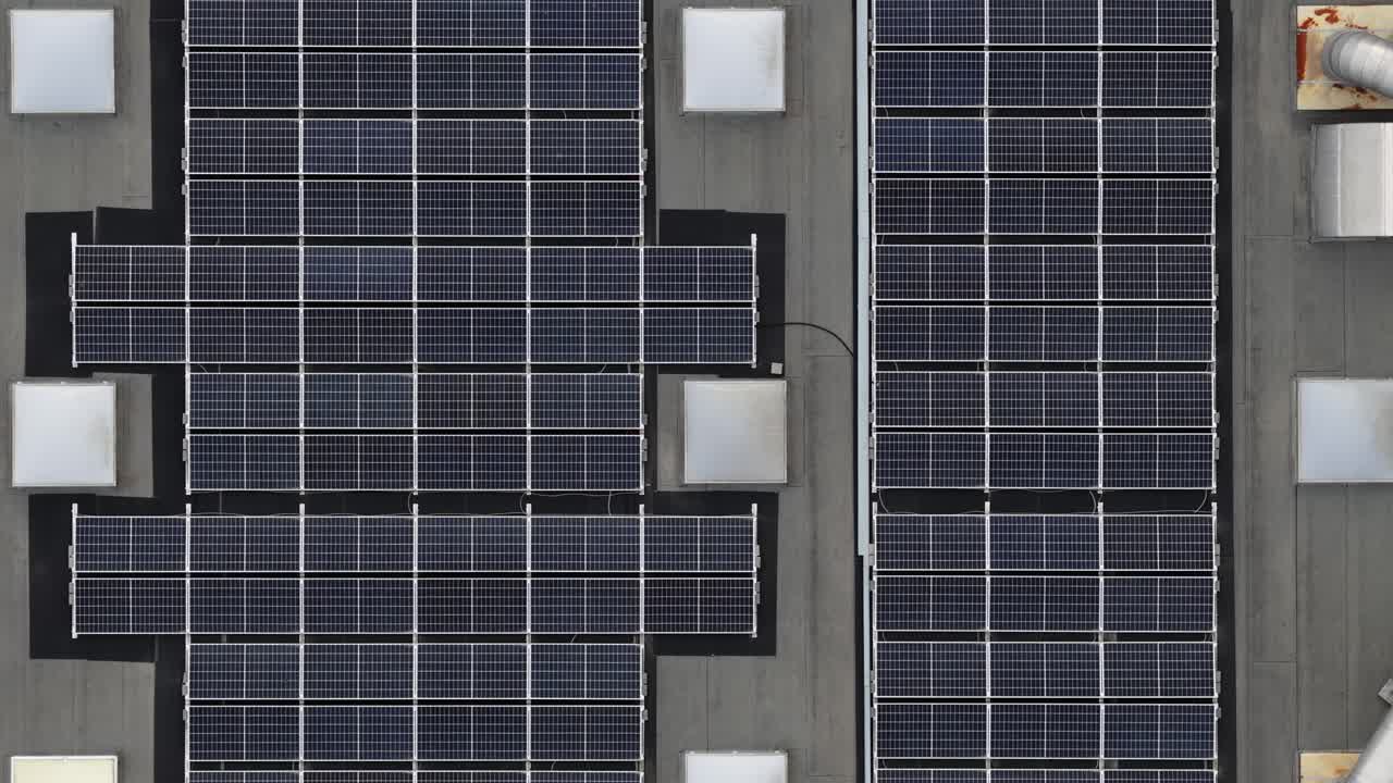 Solar panels on rooftop drone going foward
