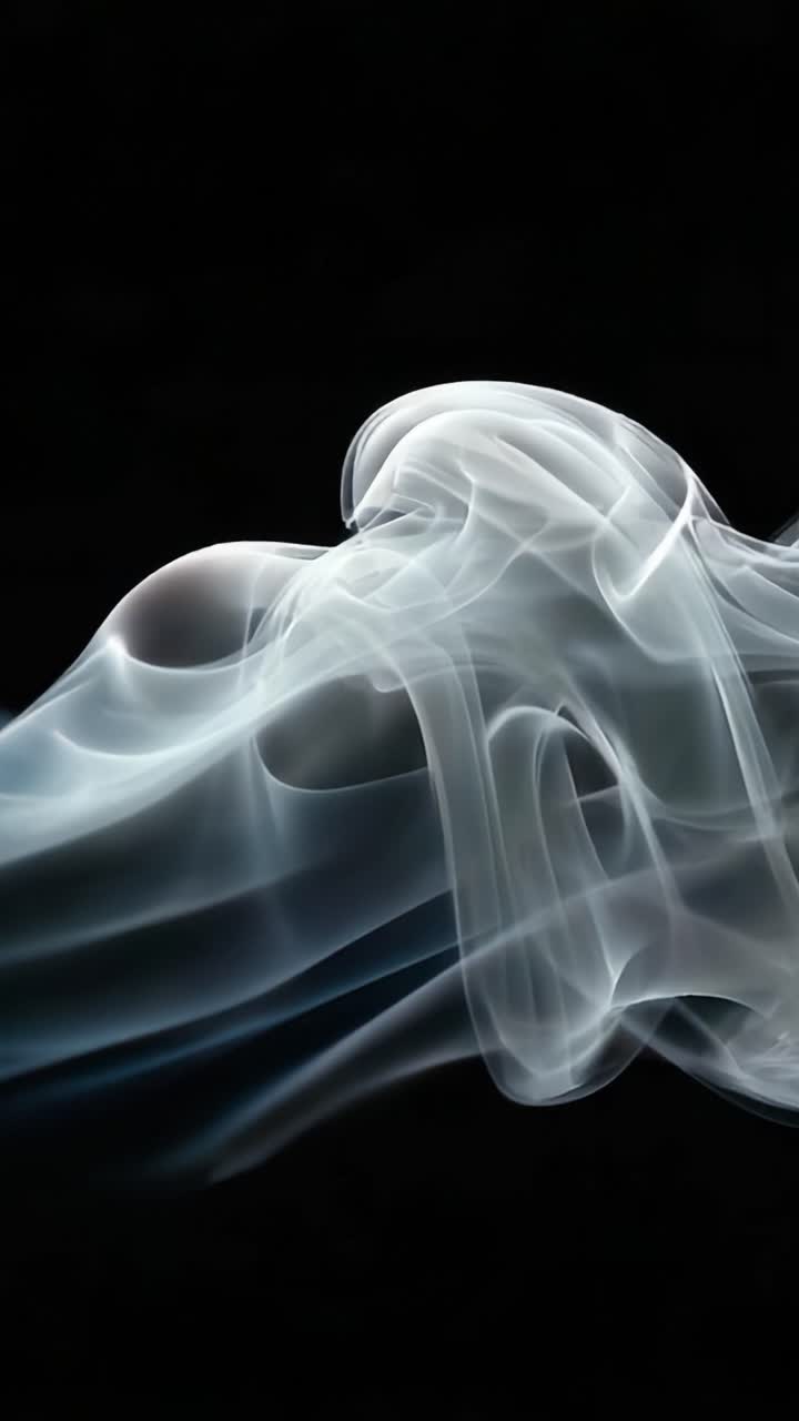 Ethereal Swirls: A Captivating Visual Journey Through the Flowing Movement of Smoke Against a Dark Background, Evoking Mystery and Intrigue