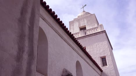 low angle establishing shot of the san diego spanish mission