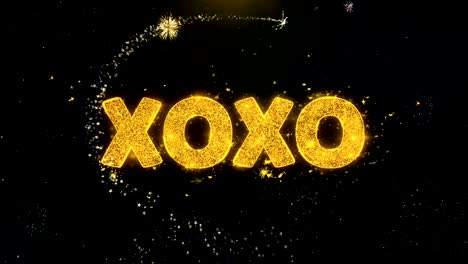 texto xo en la exhibición de fuegos artificiales de partículas de oro.