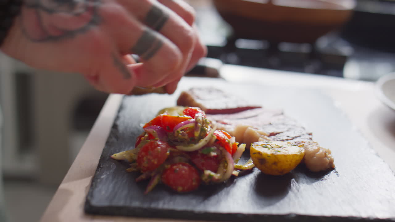 Man Styling Food before Taking Photos