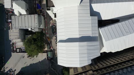 Aerial-drone-flight-with-a-birdseye-view-of-Manchester-Town-Hall-rooftop-while-it-is-under-refurbishment