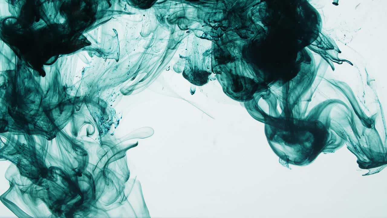 Dark Green Ink Drop Into Water On A White Background